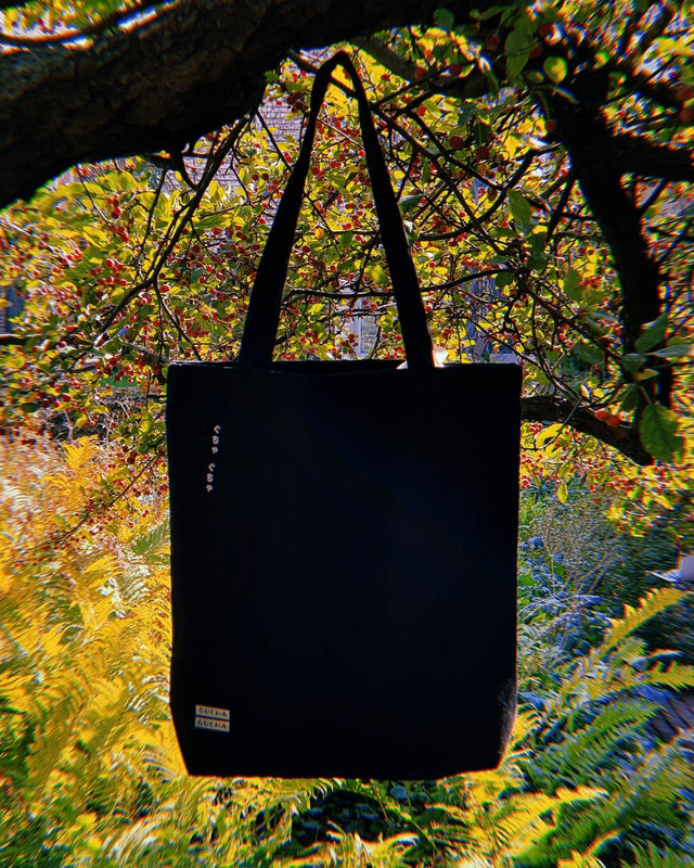 Sleeping Flower Tote Bag